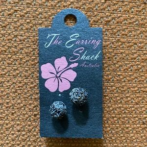 Metal globe stud earrings